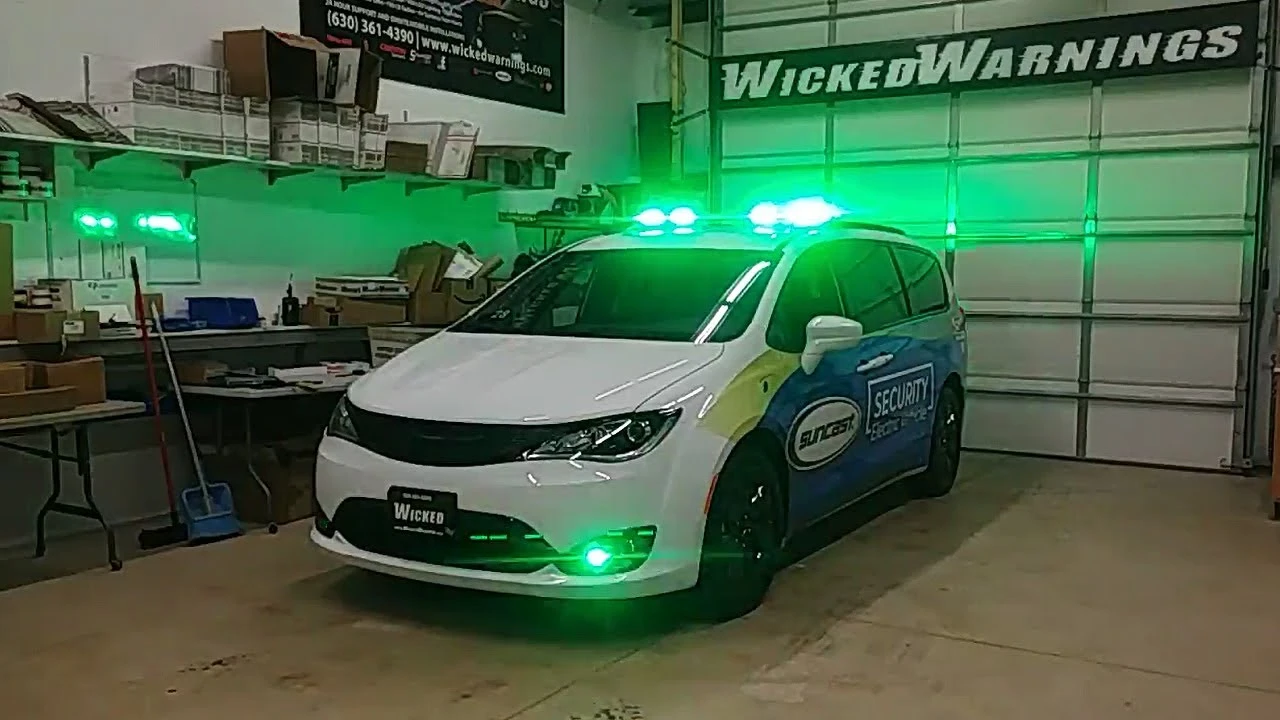 A van displaying green emergency lights on its side indicating a non emergency response vehicle in action - What Do Green Emergency Lights Mean? [ May 2026 ] - Vorlane