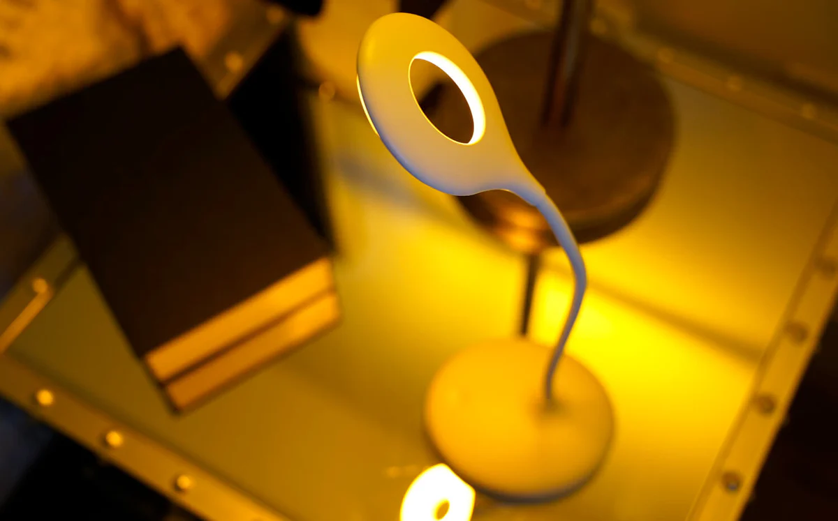 Warm yellow LED light on a study desk providing optimal illumination for reading and studying - What are the Best LED Colors for Reading and Studying? - Vorlane - Vorlane